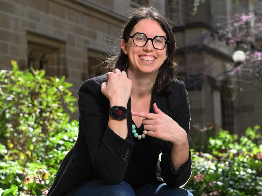 Dr Pip Karoly wearing a smartwatch, photographed for Herald Sun coverage of RiPL's heart-rate rhythms research